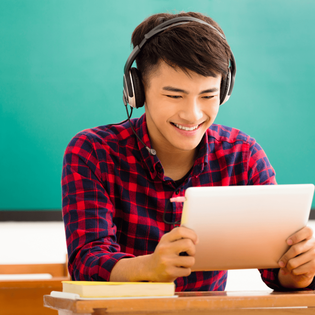 A happy English student in his online tutoring lesson. 